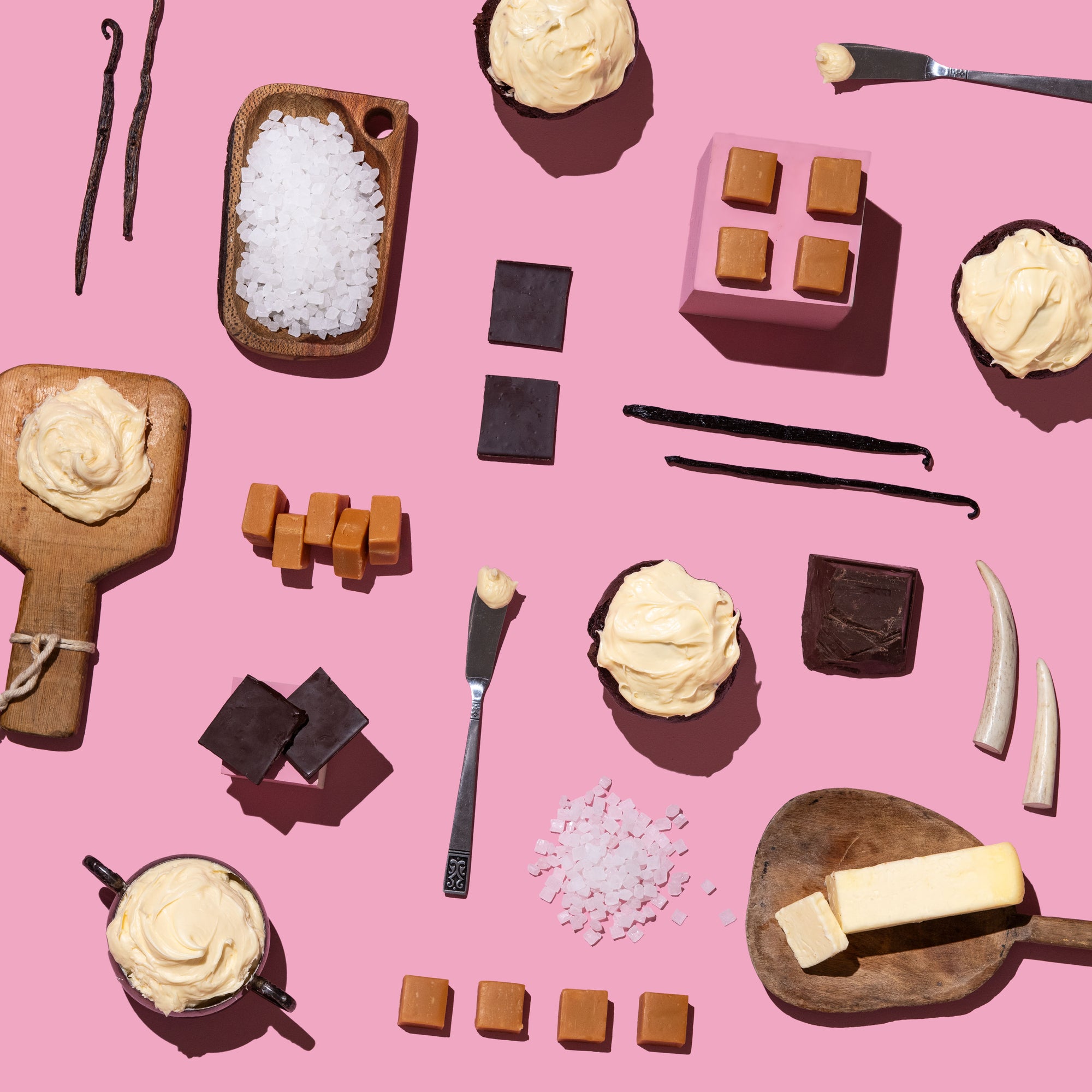 Various ingredients and desserts on a pink background